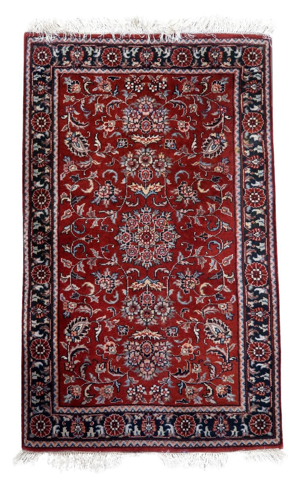 Handmade vintage Persian style Sarouk rug showcasing an elegant arch design and intricate patterns in rich red