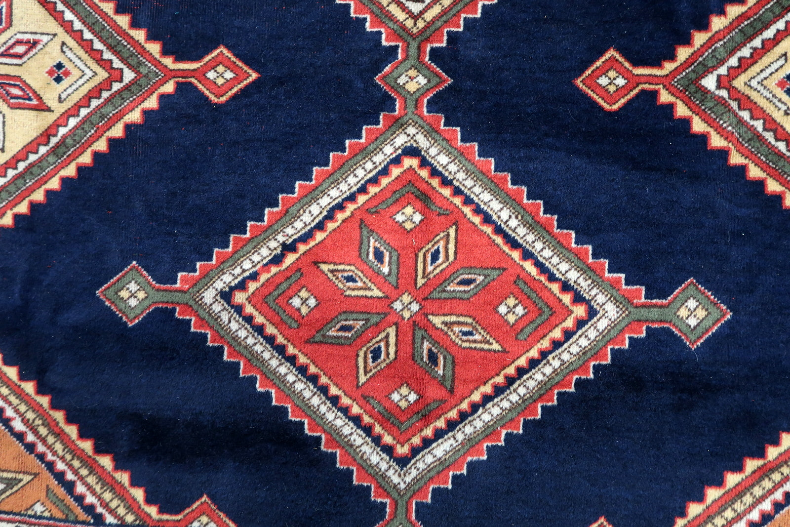 Close-up of the detailed border surrounding the central pattern, enhancing its visual appeal
