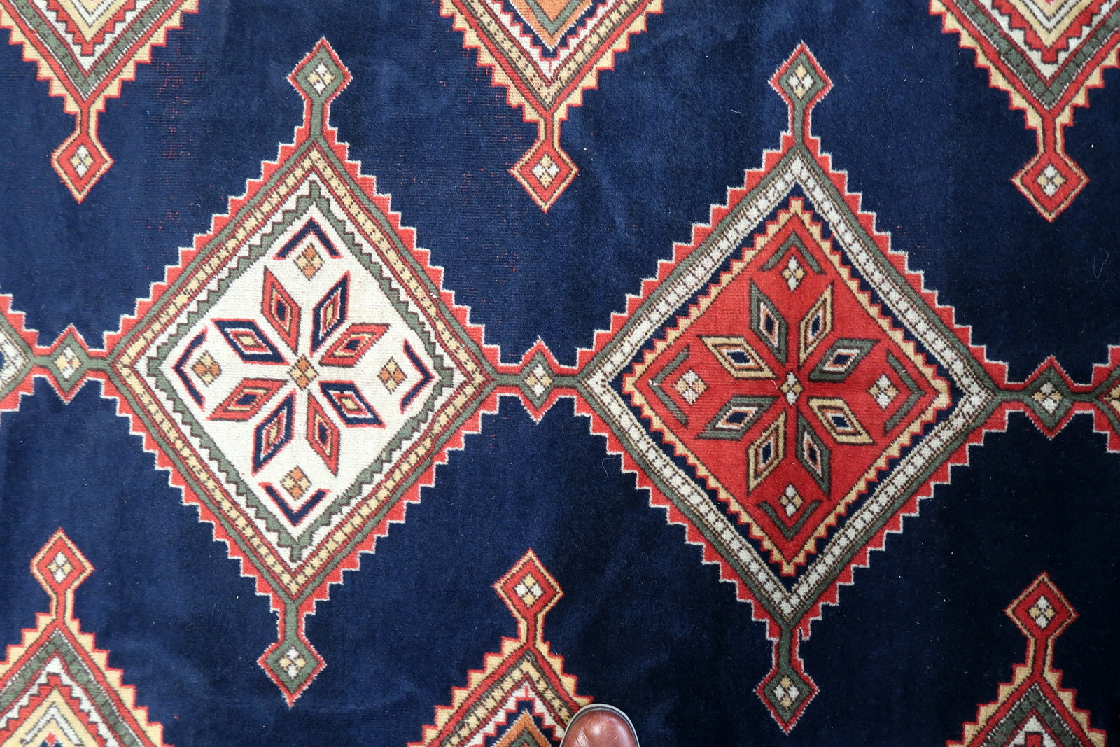 Close-up of the wool fibers, highlighting the rug's warmth and durability