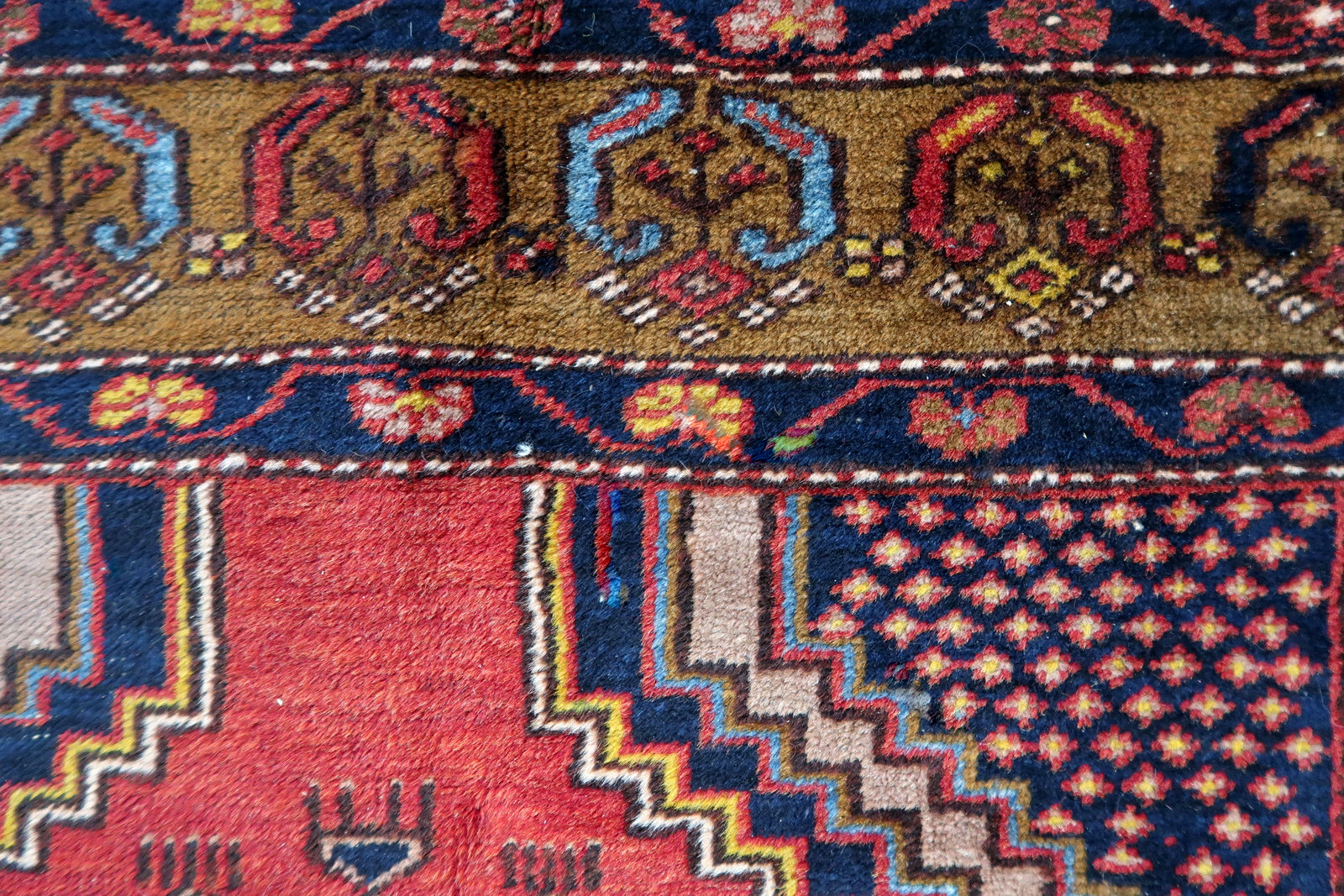 Side angle view of the rug, highlighting its thickness and plush texture
