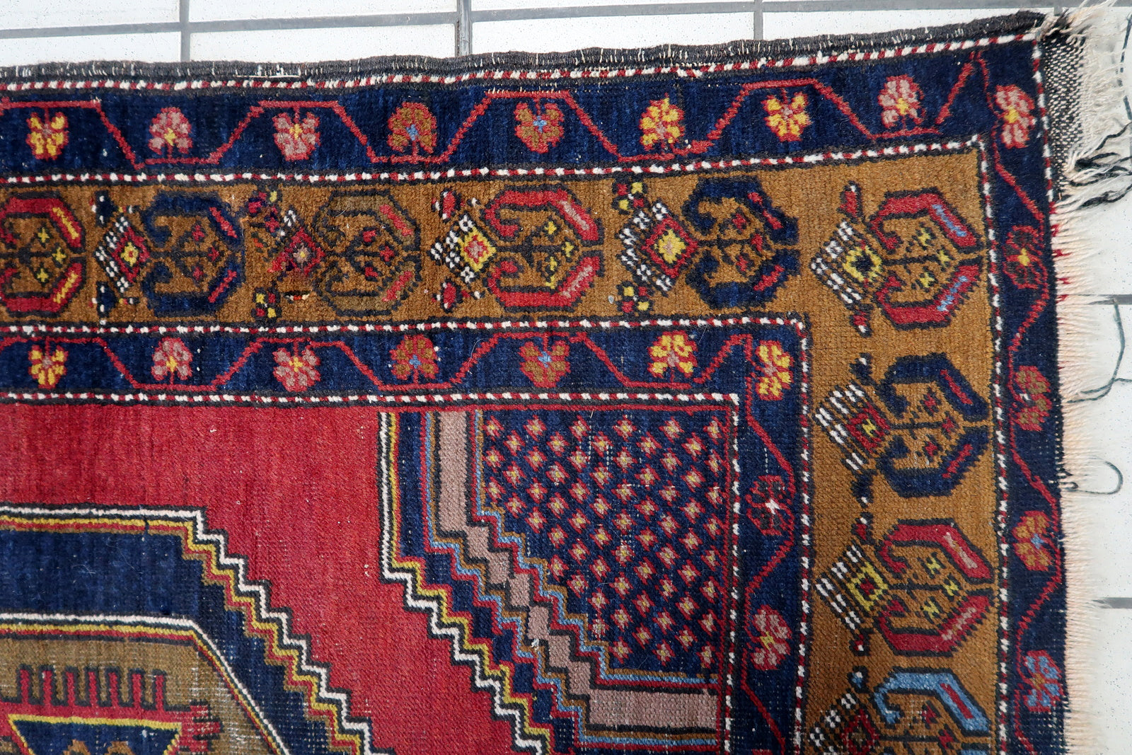 Close-up of the intricate geometric shapes in the center adorned with patterns