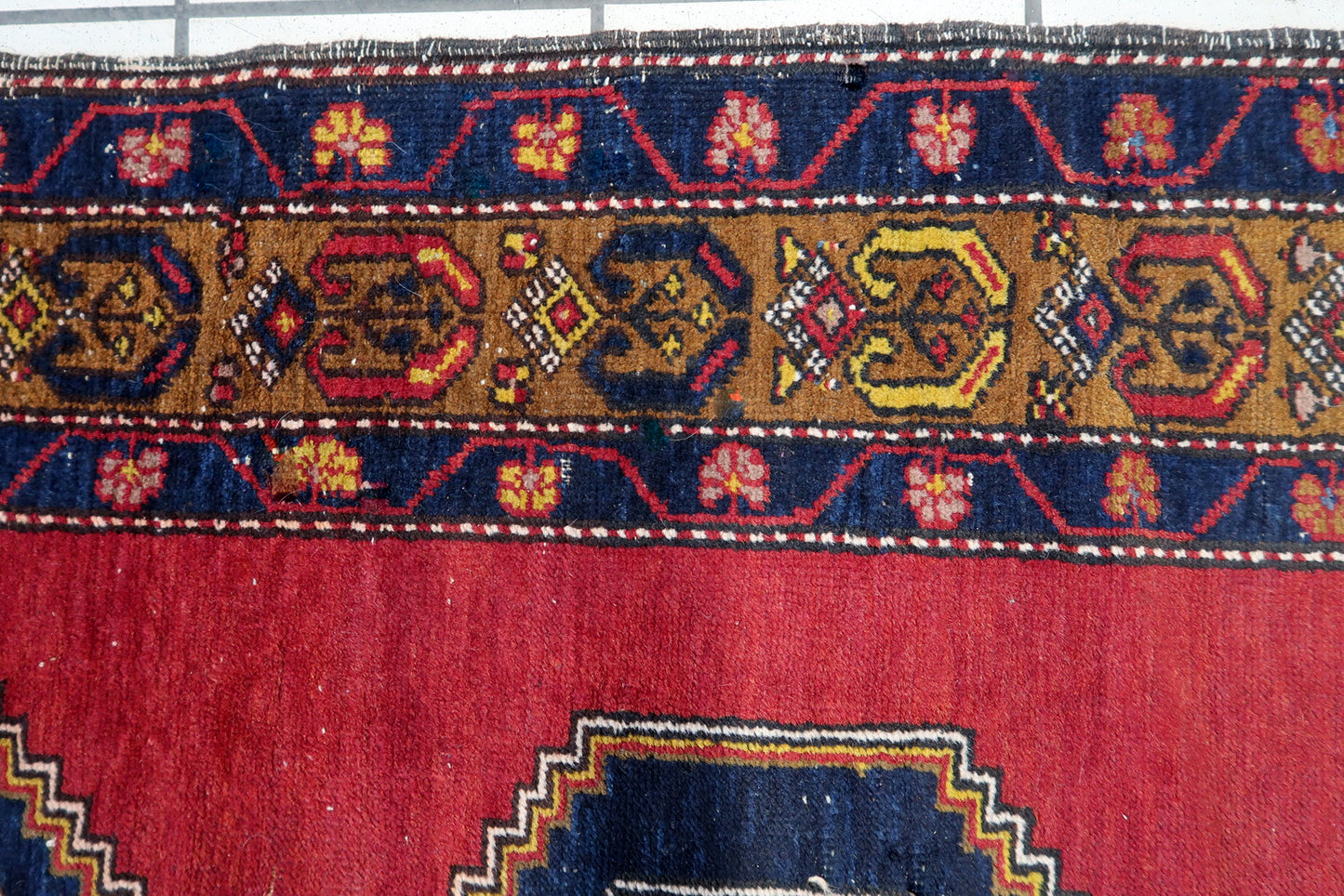 Front view of the handmade Turkish Anatolian rug adding warmth to a living room