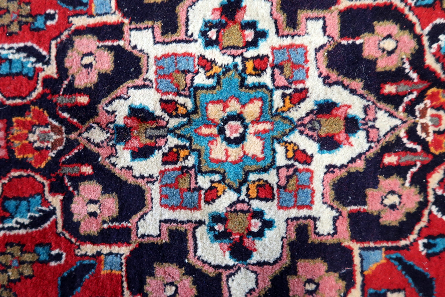 Front view of the handmade Persian Style Kashan rug adding warmth to a living room