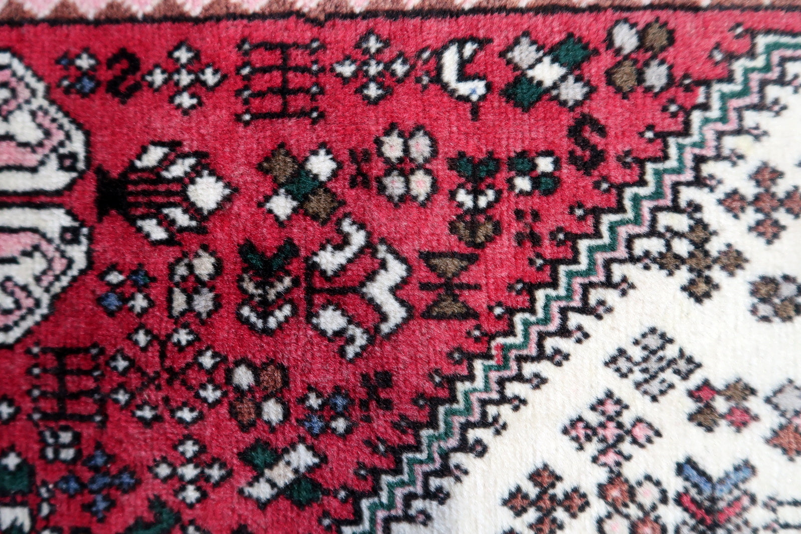 Artistic display of the rug as an accent piece in a hallway, showcasing its vibrant colors