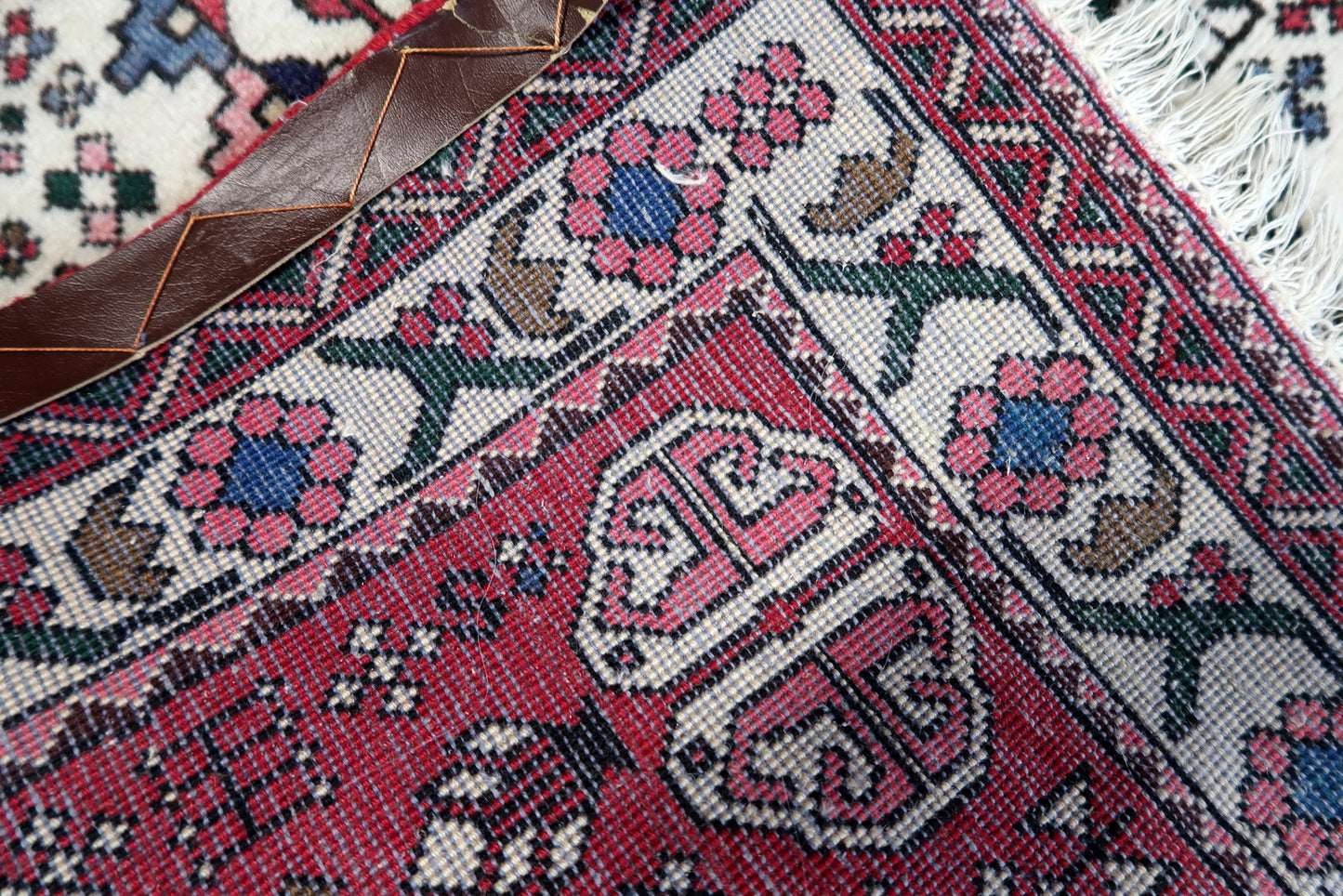 Back view of the vintage Persian Malayer rug highlighting its craftsmanship and size