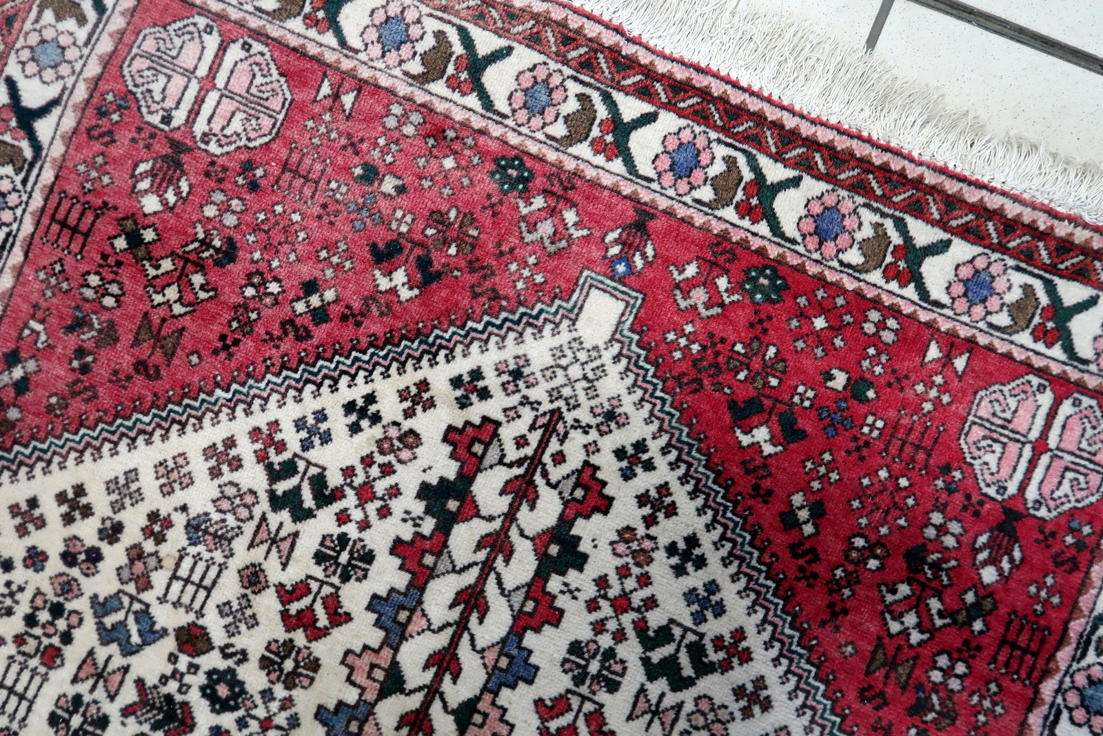 Side view of the medium-sized rectangular rug made from high-quality wool fibers
