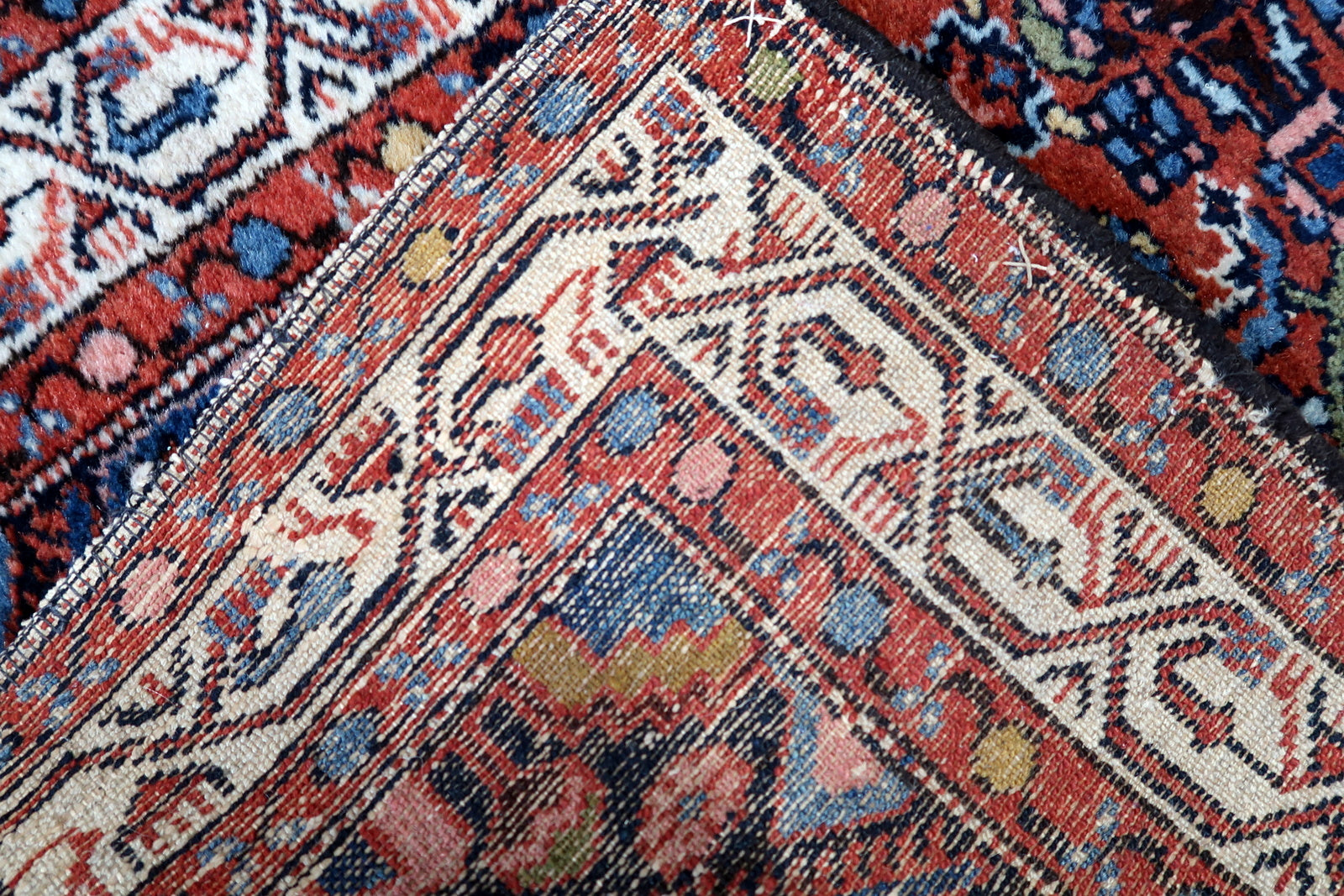 Back view of the vintage Persian rug highlighting its craftsmanship and size