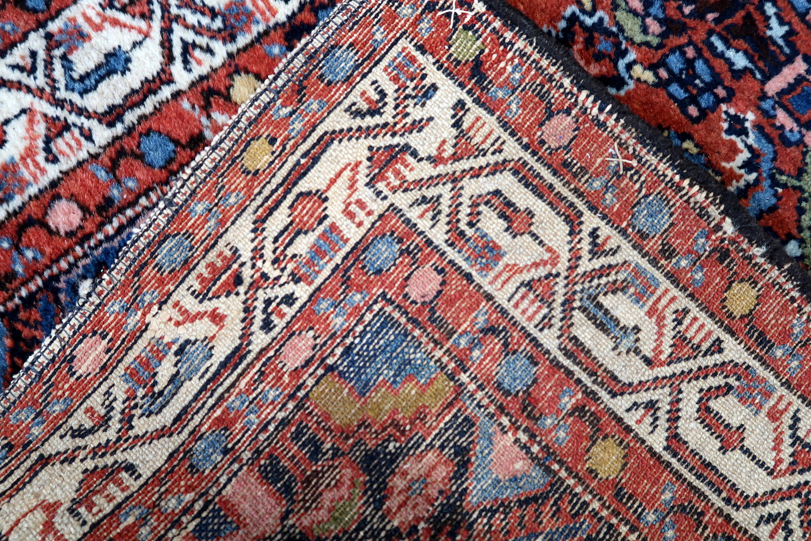 Back view of the vintage Persian rug highlighting its craftsmanship and size