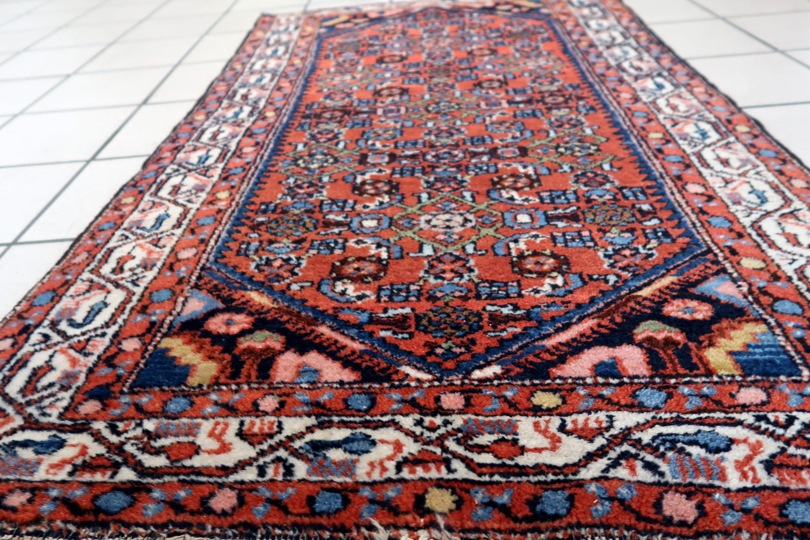 Side angle view of the rug, highlighting its thickness and plush texture