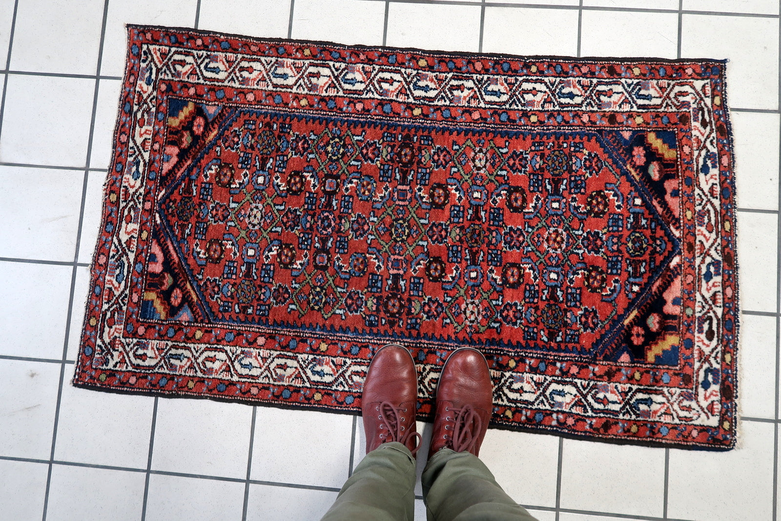 Artistic display of the rug as an accent piece in a hallway, showcasing its vibrant colors