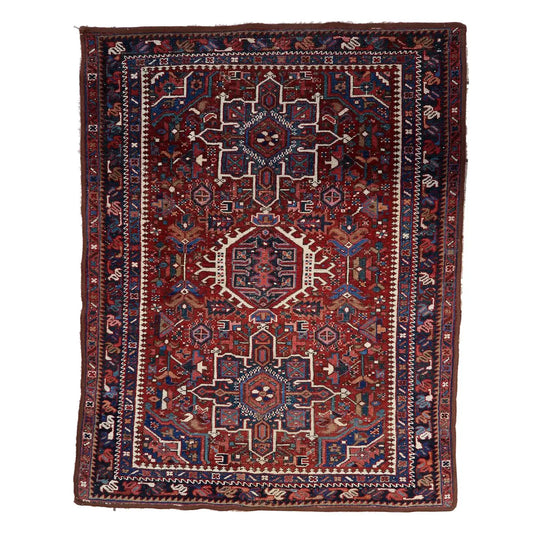Handmade Antique Persian Hamadan Rug showcasing intricate symmetrical patterns and geometric motifs in deep reds, blues, and creams