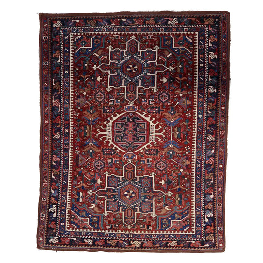 Handmade Antique Persian Hamadan Rug showcasing intricate symmetrical patterns and geometric motifs in deep reds, blues, and creams