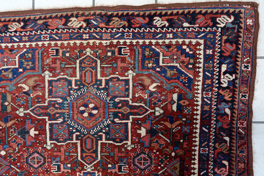 Close-up of the rug's central pattern, revealing the craftsmanship and intricate details