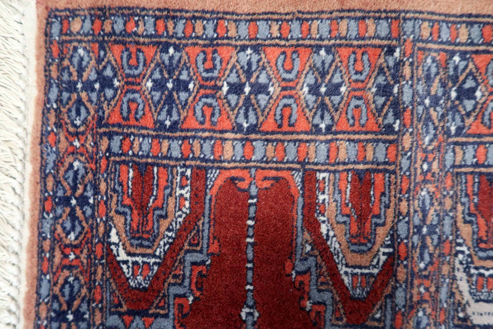 Detailed view of the intricate border patterns, reflecting meticulous artistry