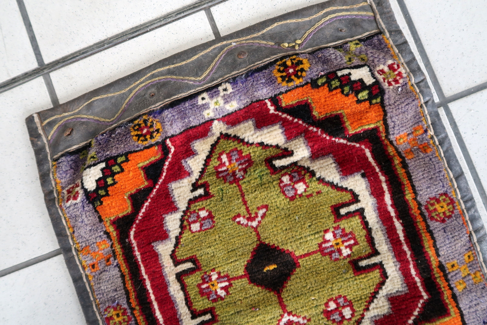 Close-up Detail of Vibrant Green, Red, Orange, and Beige Colors on Vintage Persian Afshar Saddle Bag - 1940s