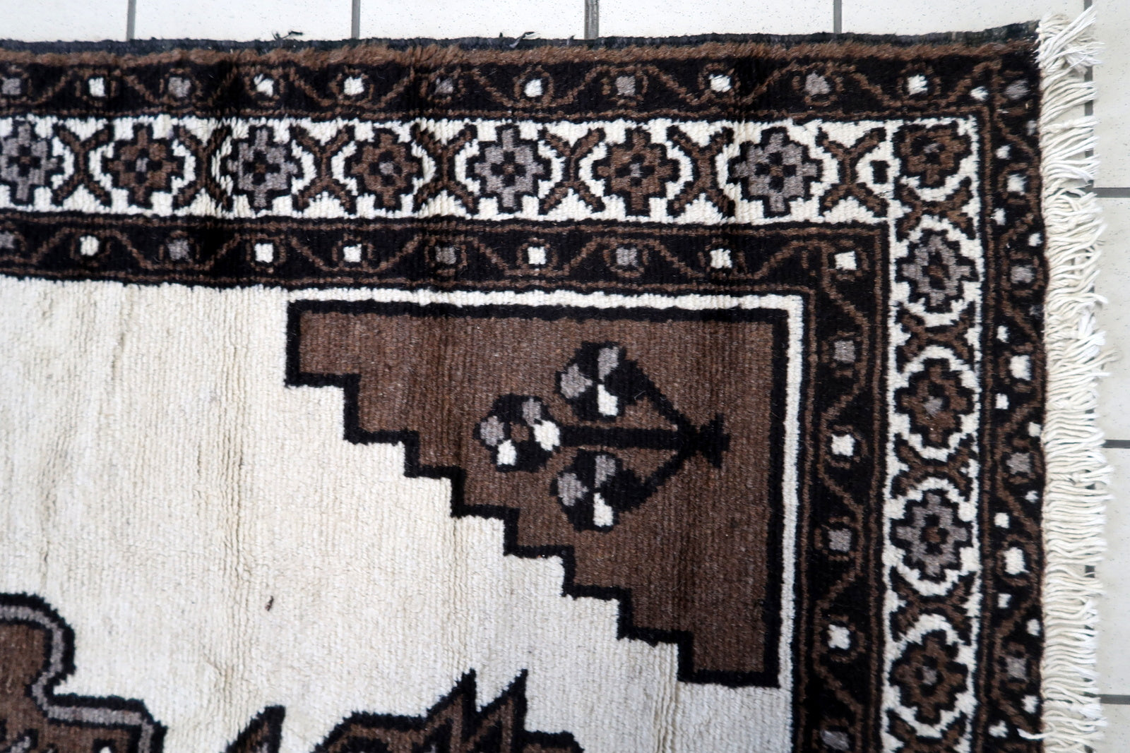 Close-up Detail of Warm Cream Base Color on Vintage Persian Gabbeh Rug - 1970s