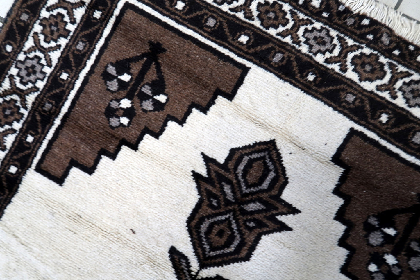 Intricate Designs in Dark Brown and Black Creating Contrast on Handmade Vintage Persian Gabbeh Rug - 1970s
