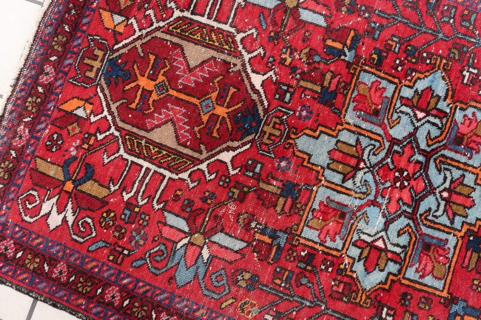 Two Prominent Diamond-Shaped Patterns Capturing Attention on Vintage Persian Rug - 1920s