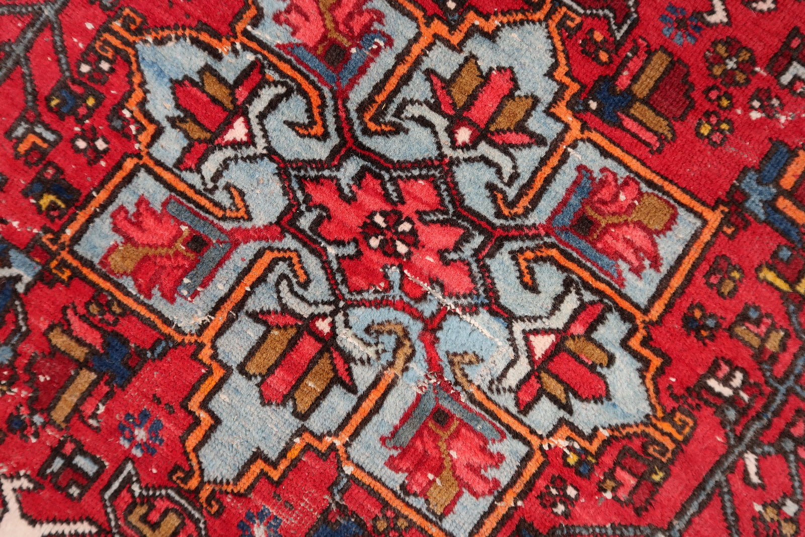 Complementary Shades of Blue, White, and Brown Creating Visual Contrast on Vintage Wool Rug - 1920s