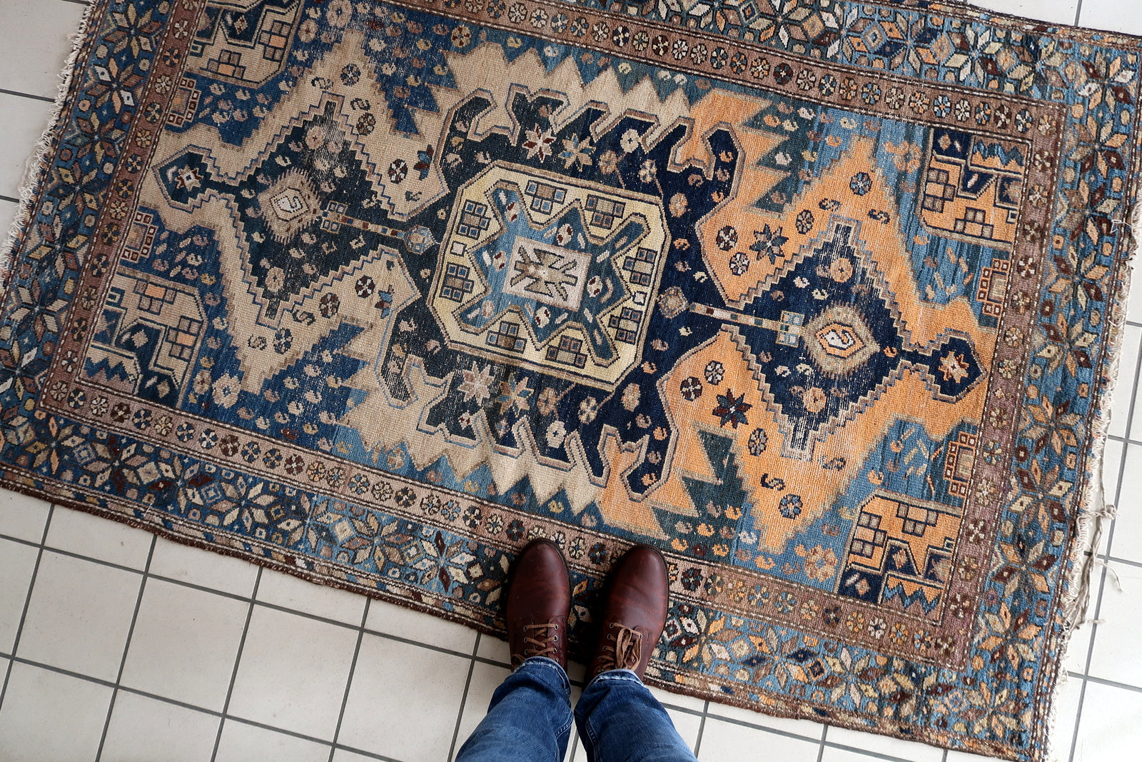 Close-up of elegant study setting with Handmade Antique Caucasian Shirvan Rug - Detailed view showcasing the rug as an elegant addition to a study.