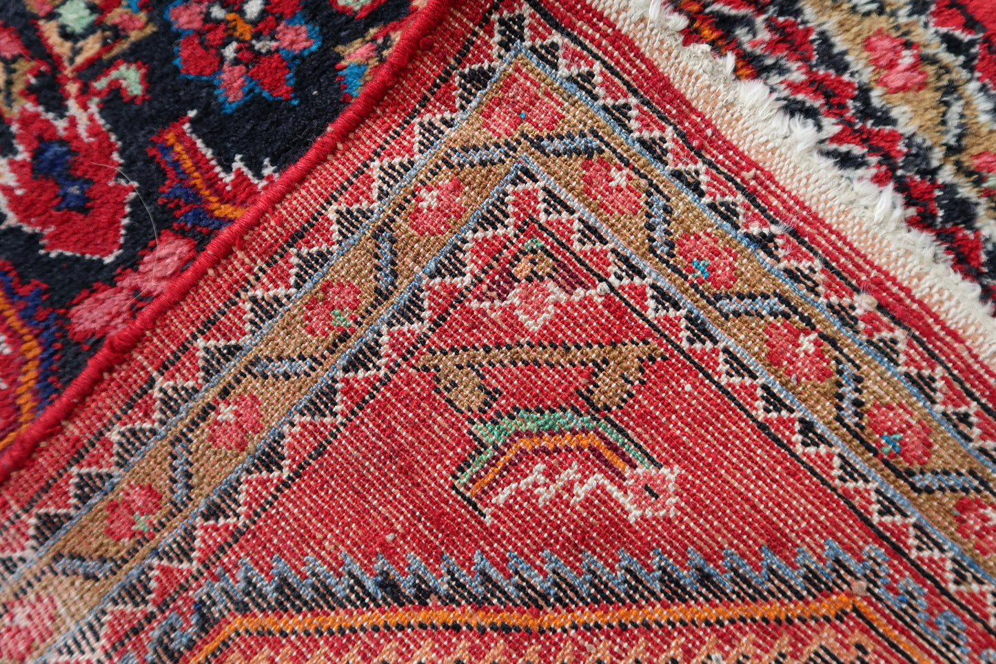 Back side of the Handmade Vintage Persian Hamadan Rug - Underside view revealing the rug's construction and material.