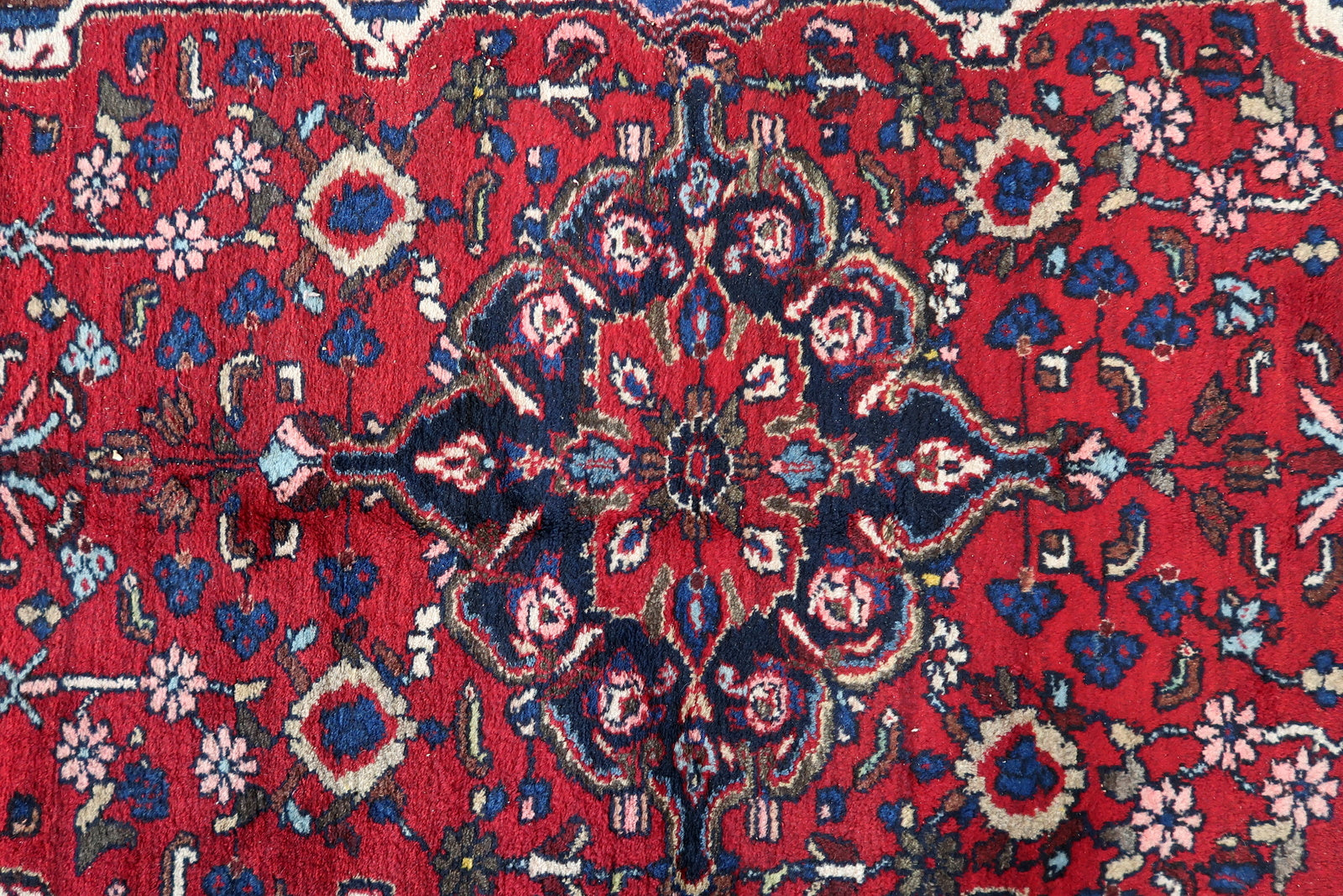 Close-up of rug's corner on Handmade Vintage Persian Malayer Rug - Detailed view capturing the corner of the rug with its design.