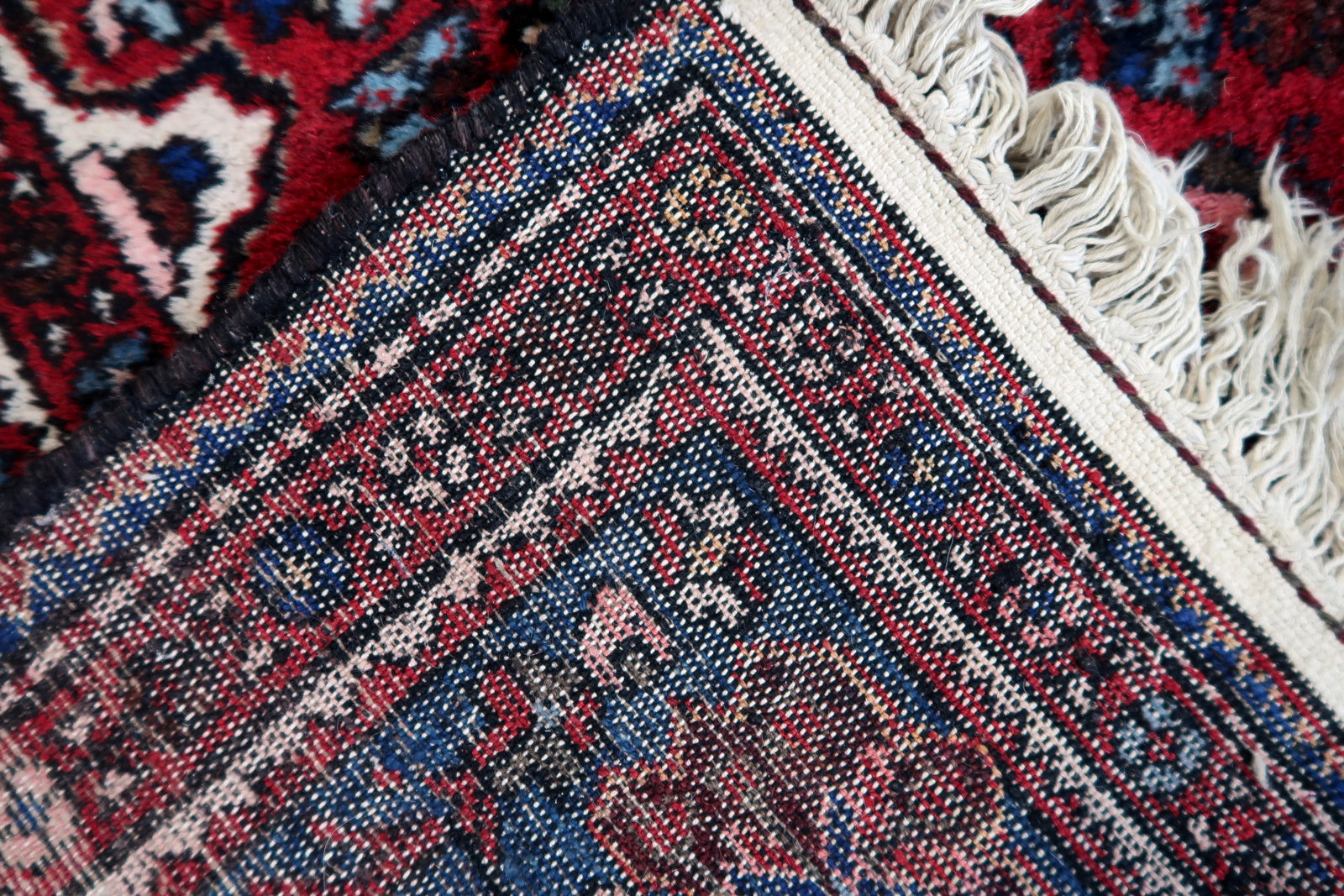 Back side of the Handmade Vintage Persian Malayer Rug - Underside view revealing the rug's construction and material.