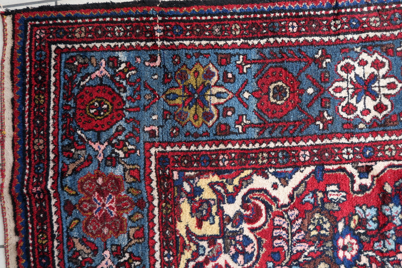 Close-up of green hues on Handmade Vintage Persian Malayer Rug - Detailed view showcasing the rich green tones.