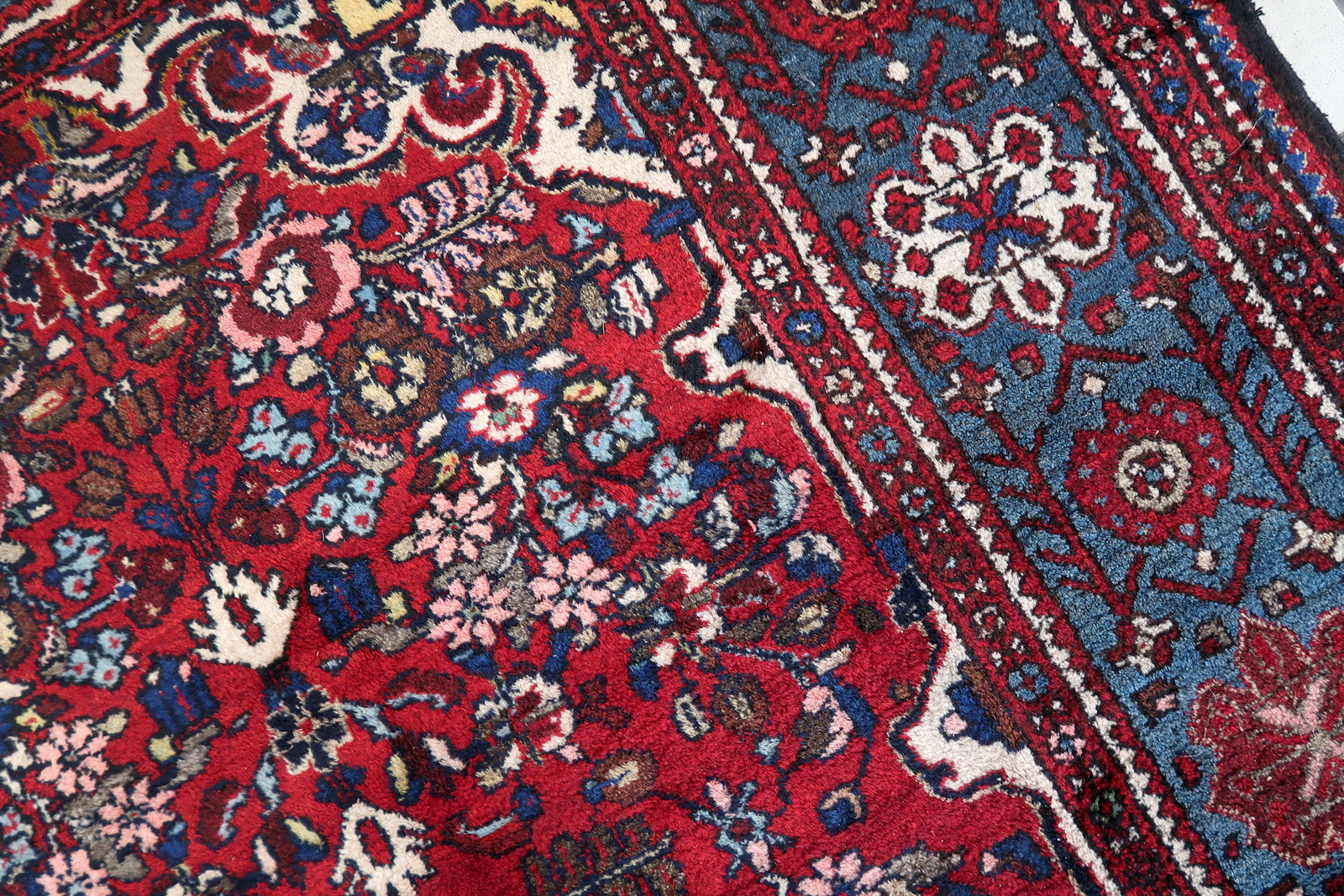 Close-up of orange hues on Handmade Vintage Persian Malayer Rug - Detailed view emphasizing the warm orange colors.