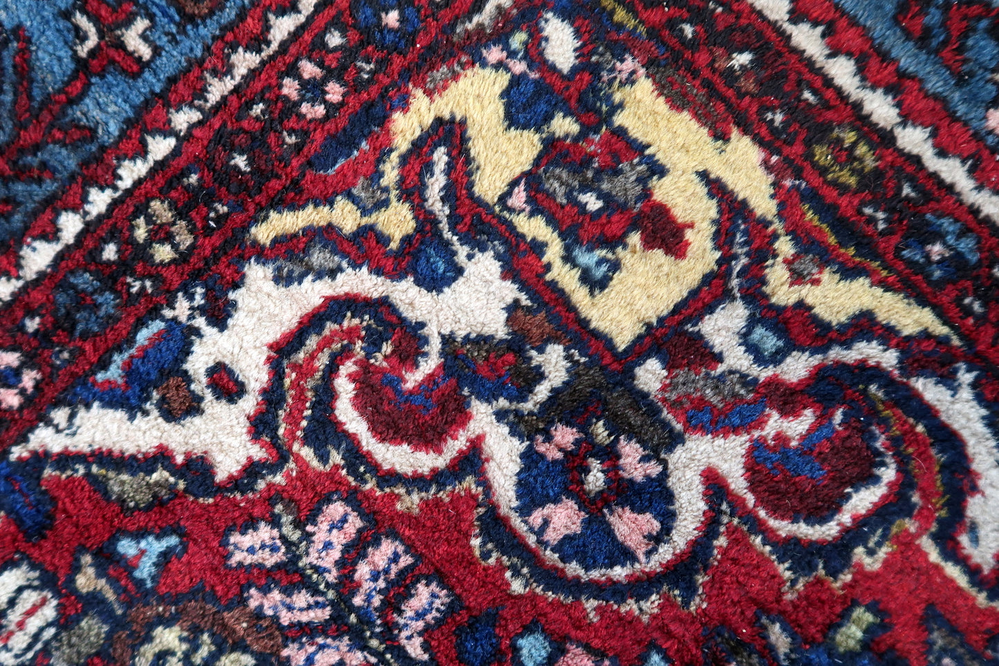 Close-up of floral motifs on Handmade Vintage Persian Malayer Rug - Detailed view highlighting the intricate floral designs.