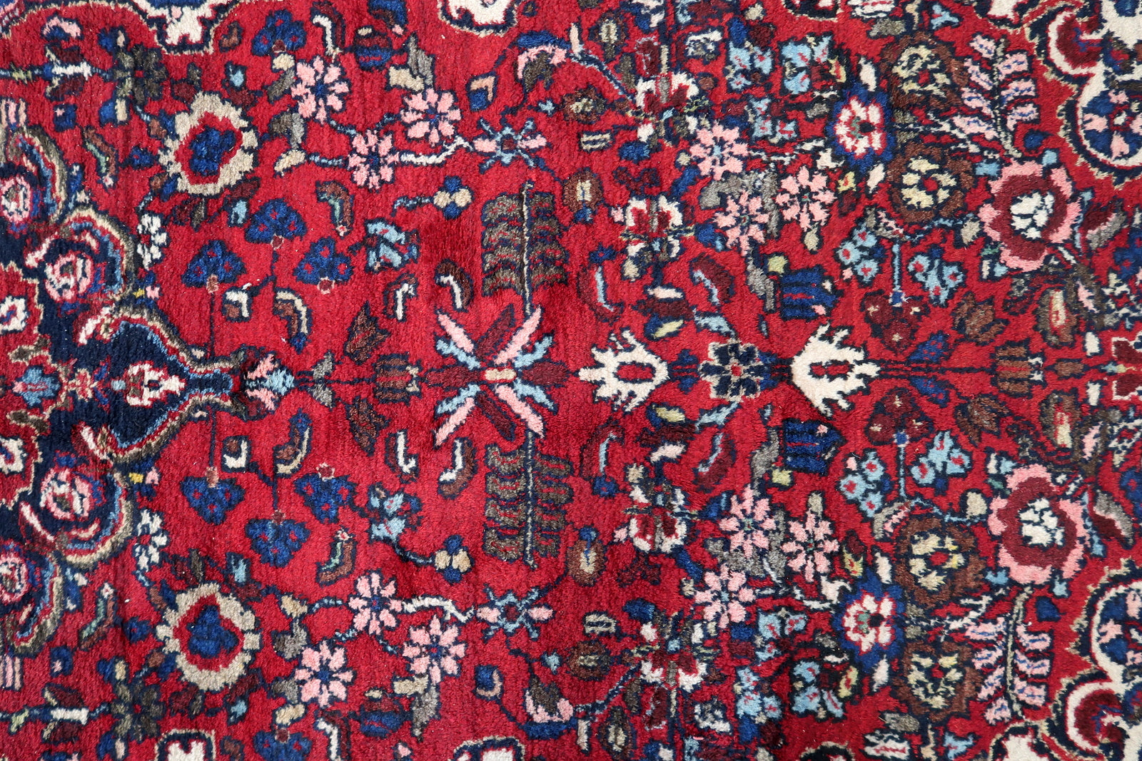 Close-up of symmetrical patterns on Handmade Vintage Persian Malayer Rug - Detailed view showcasing the symmetrical patterns.