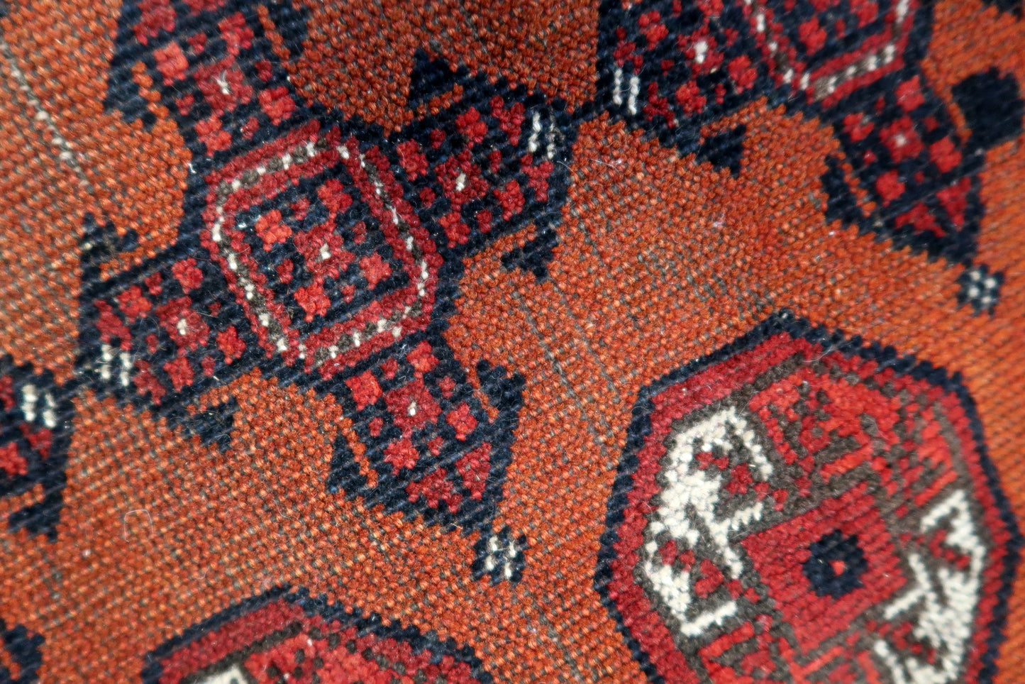 Close-up of vintage charm on Handmade Antique Afghan Baluch Rug - Detailed view emphasizing the rug's vintage charm and historical significance.