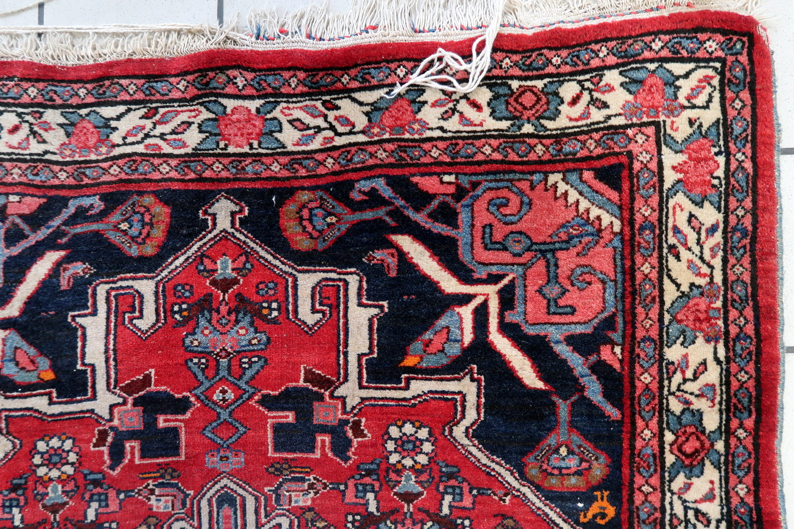 Close-up of dense weaving on Handmade Vintage Persian Bidjar Rug - Detailed view highlighting the dense weaving contributing to the rug's plush texture.