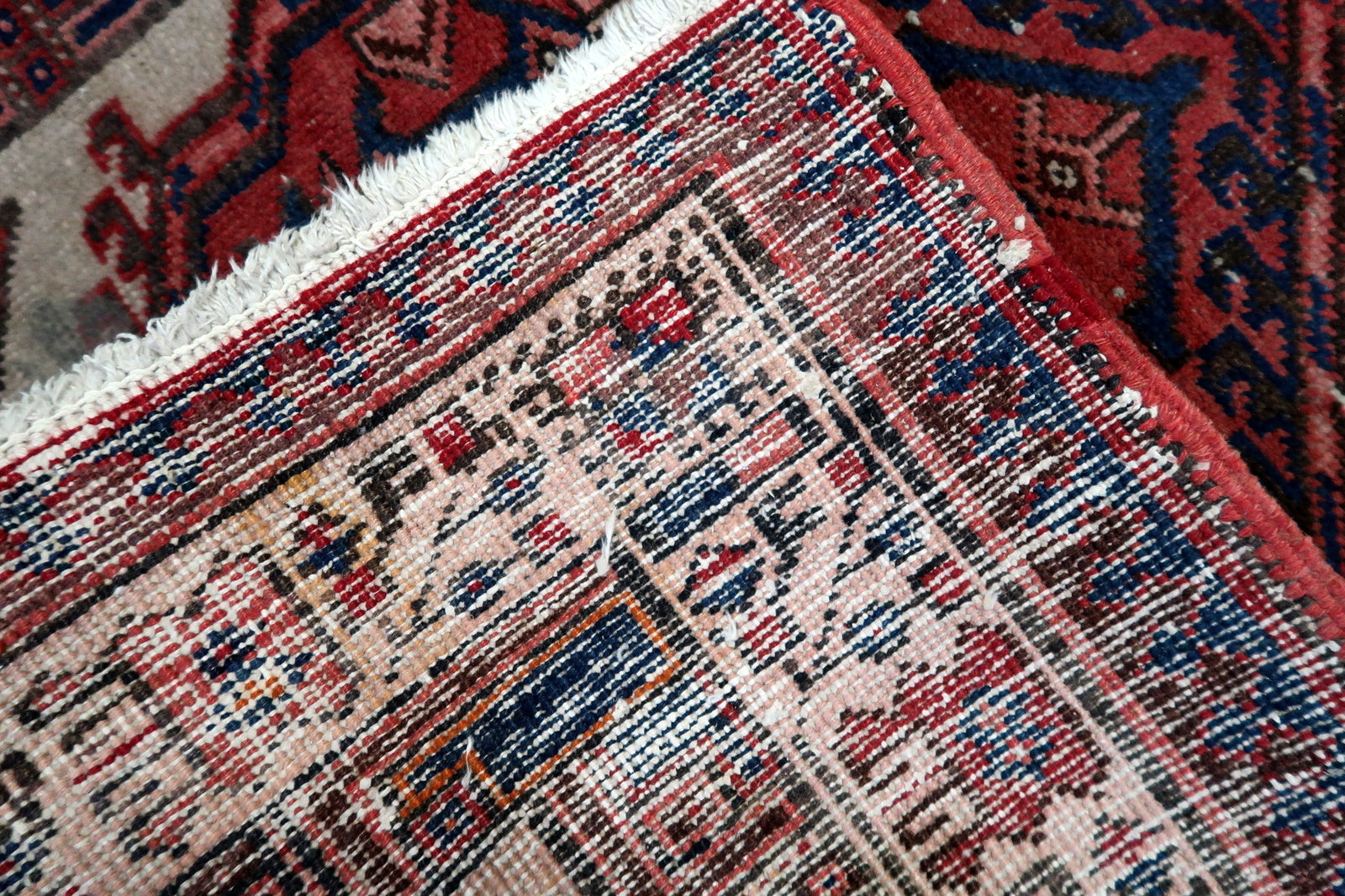 Hallway placement of a 10.6-foot antique Persian runner rug
