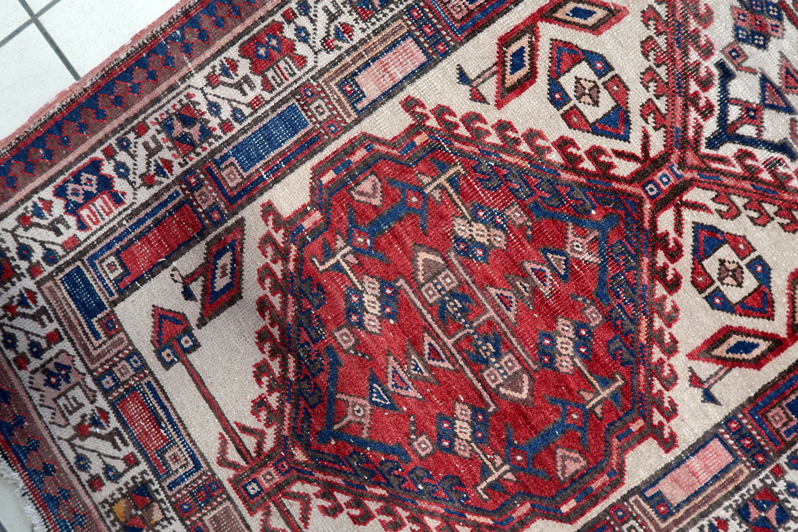 Long Persian Serab runner rug with deep red, ivory, and soft brown tones
