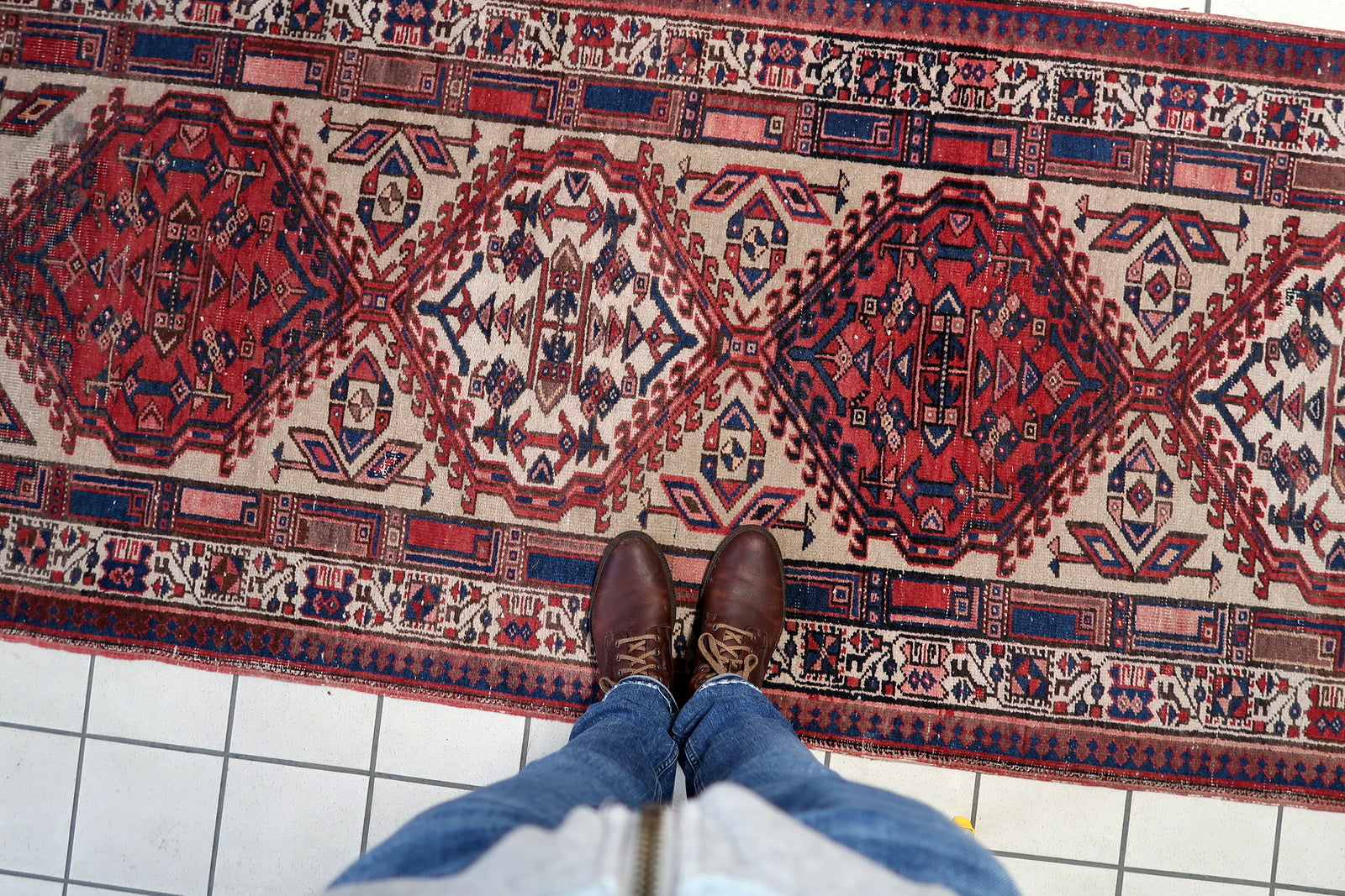 Authentic Persian Serab rug with rich earthy tones and geometric details

