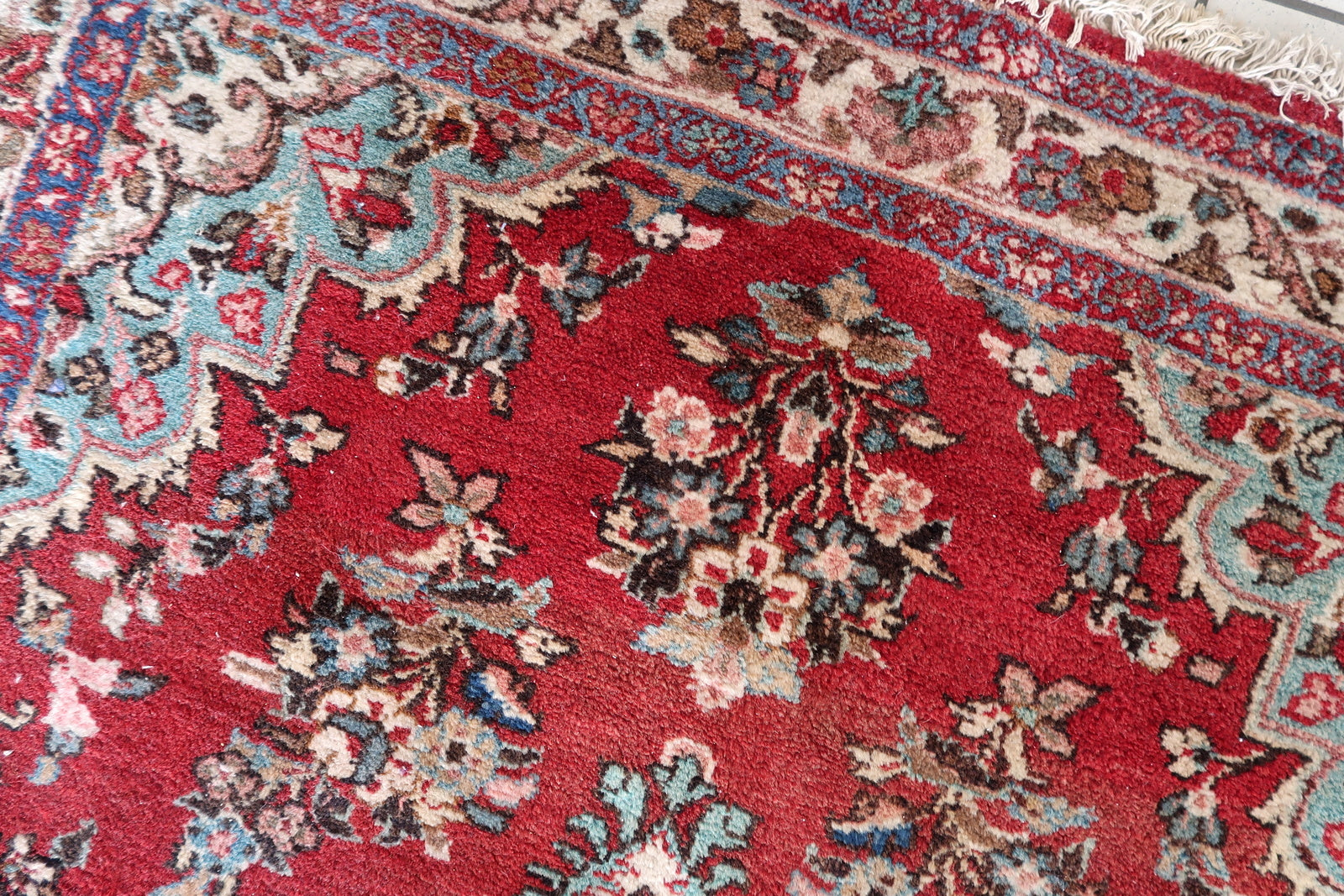 Traditional Malayer wool rug with central field pattern

