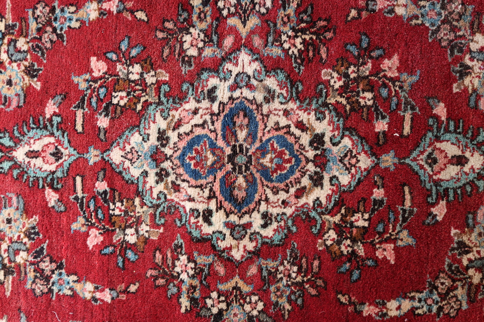 Mid-century Persian rug with patina

