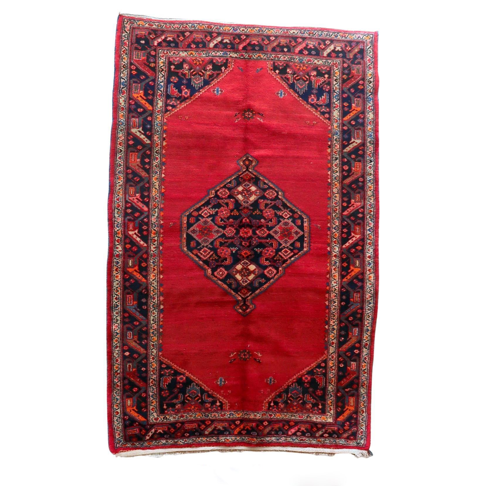 Vintage Persian Hamadan rug with an intense cerise red field.


