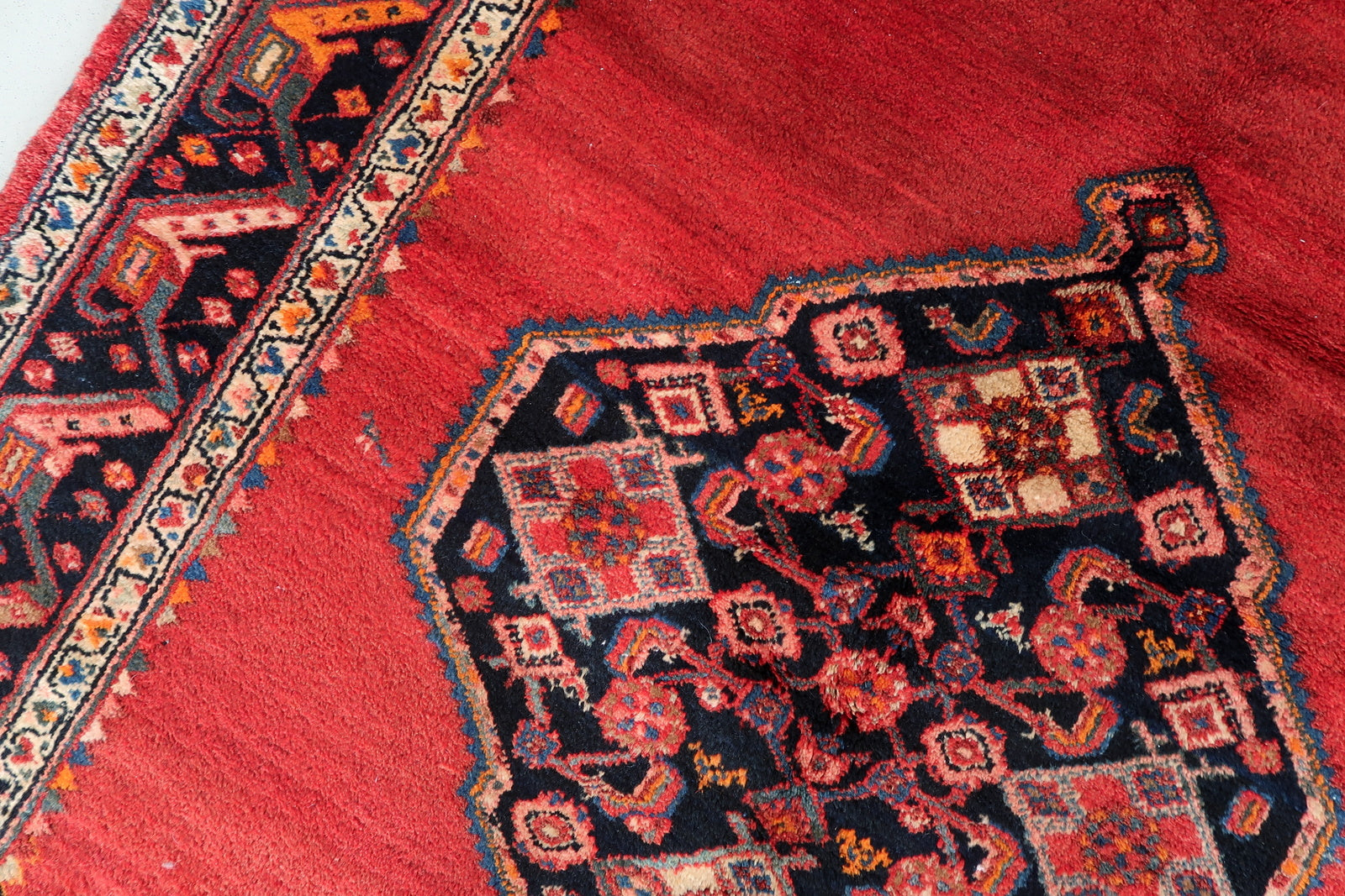 Close-up showing the rich color saturation and sturdy wool texture.

