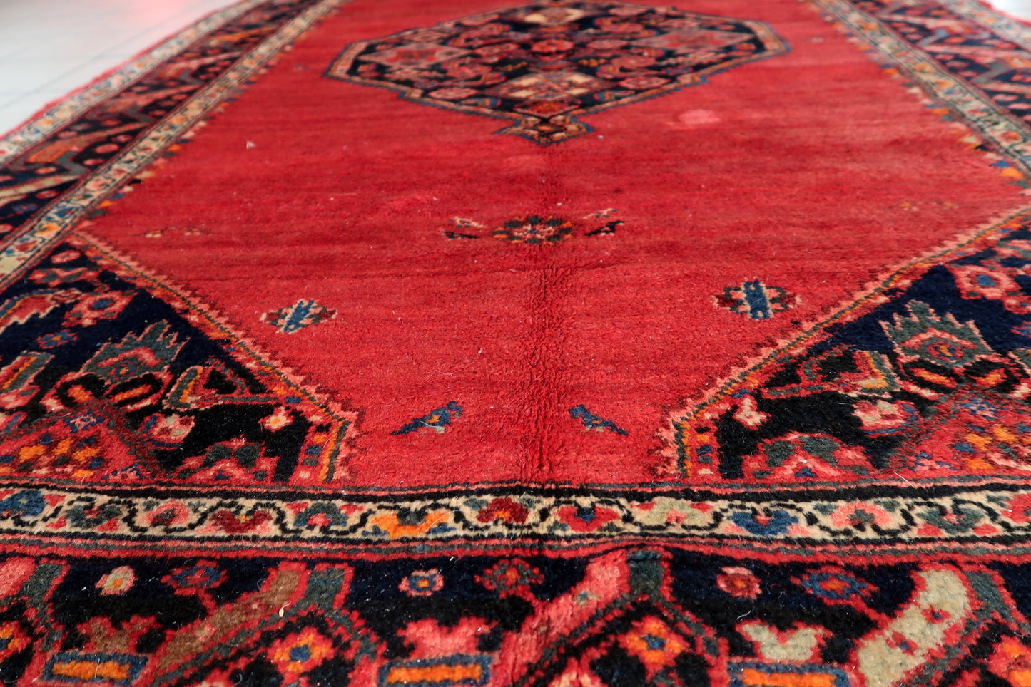Side profile illustrating the rug's thick and resilient pile height.

