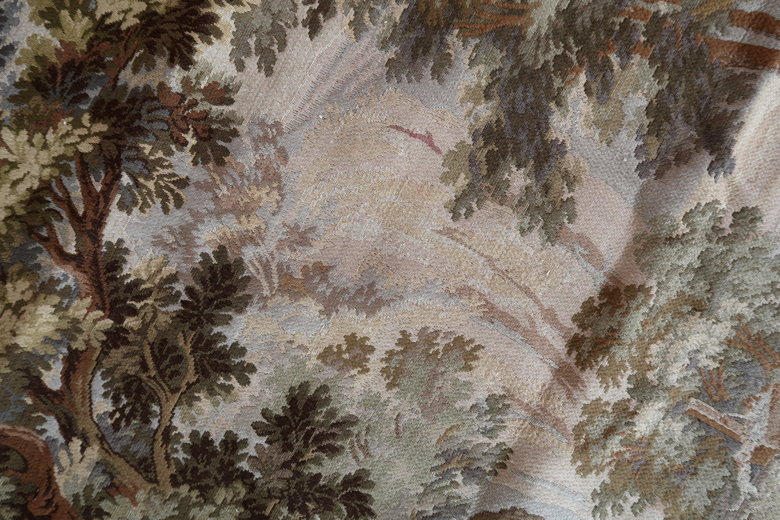 Top section of the tapestry showing the mature forest canopy.


