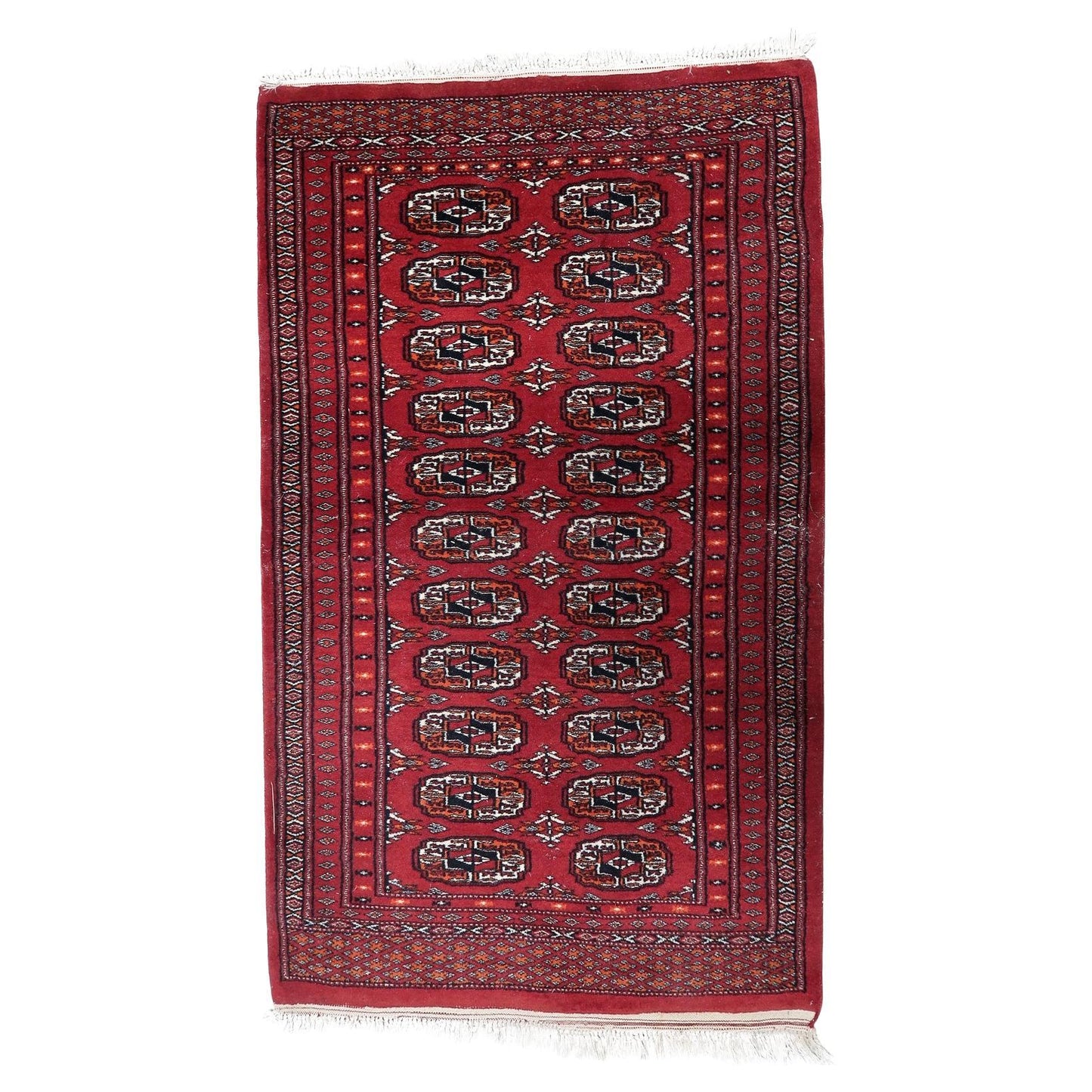 Vintage Uzbek Bukhara runner with repeating geometric gul motifs.

