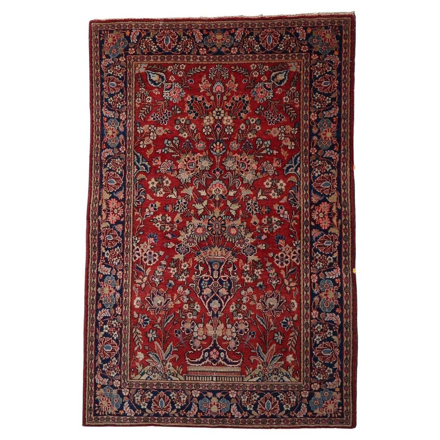 Antique Persian Kashan rug with a central Tree of Life design.

