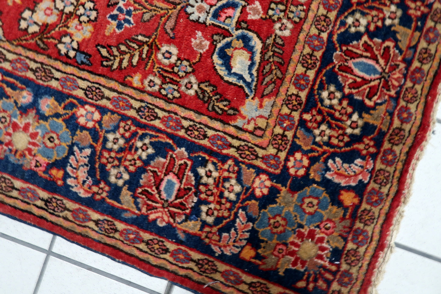 Top-down photograph capturing the rug's elegant symmetry.


