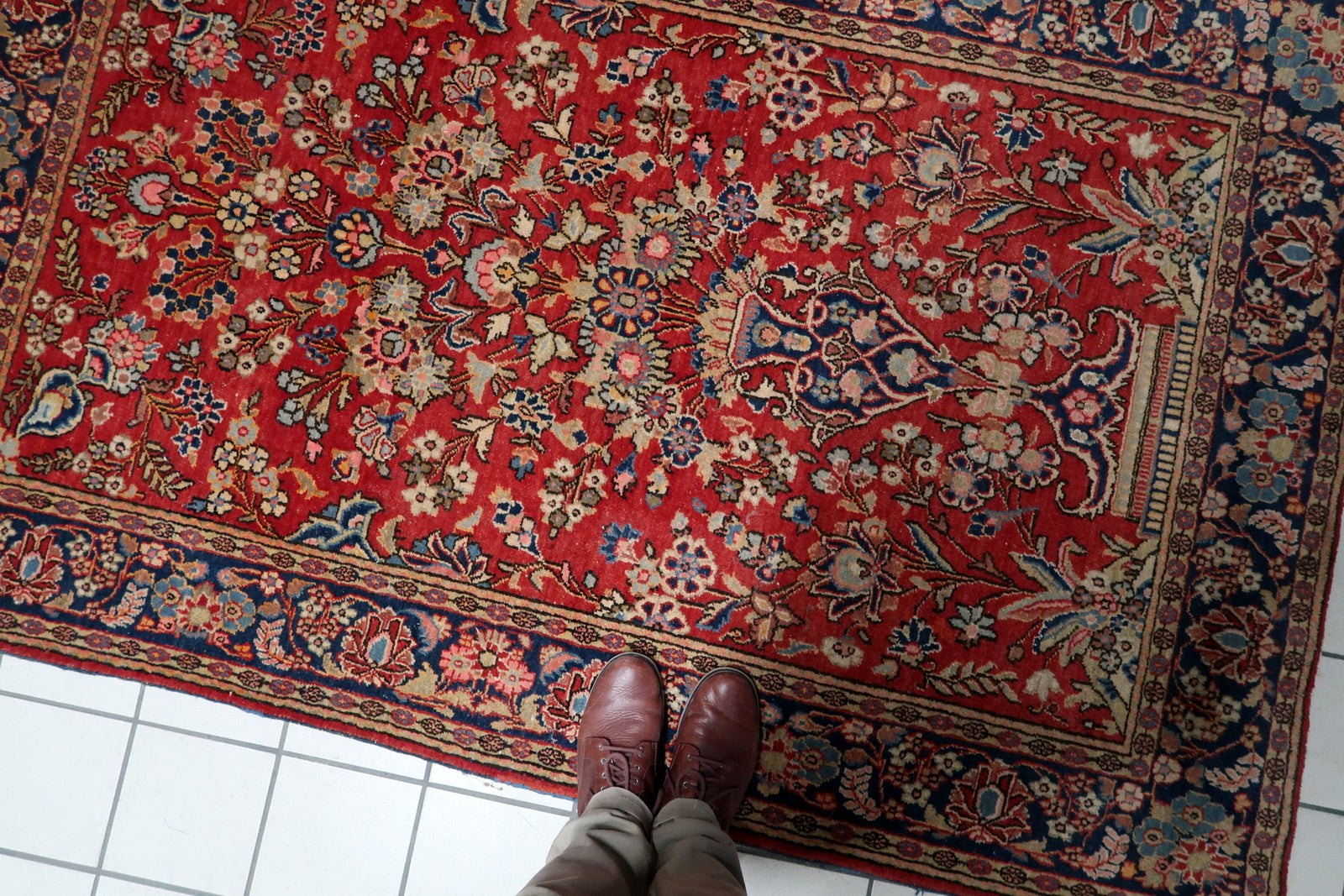 Full view of the rug showcasing the balanced floral composition.

