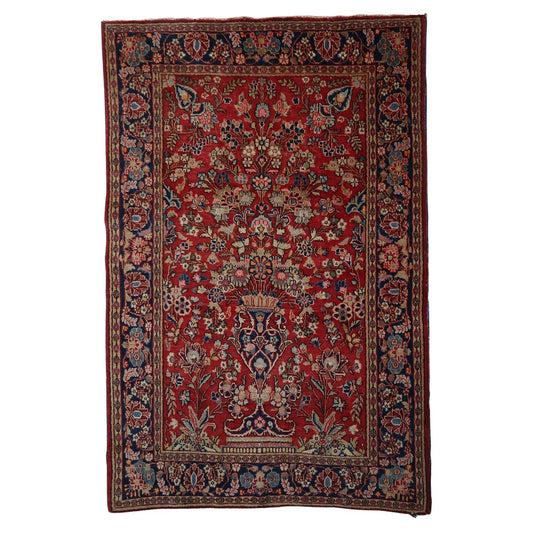 Antique Kashan rug with a lush all-over floral Tree of Life design.

