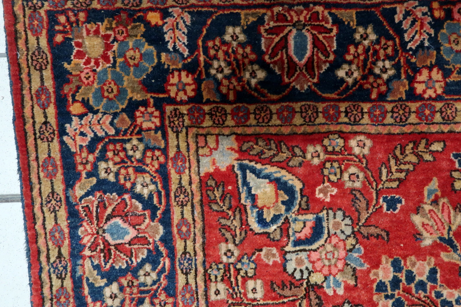 Full view of the rug showcasing the balanced floral composition.

