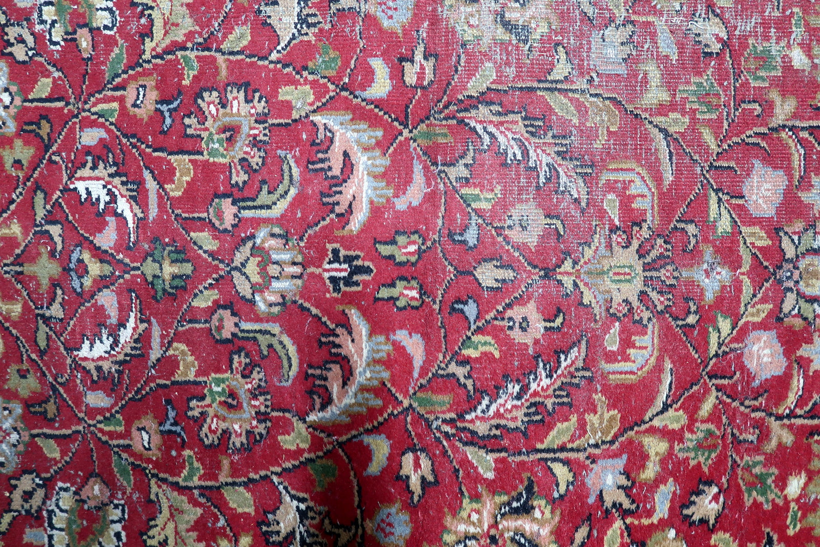 Cream and black accents within the intricate floral motifs

