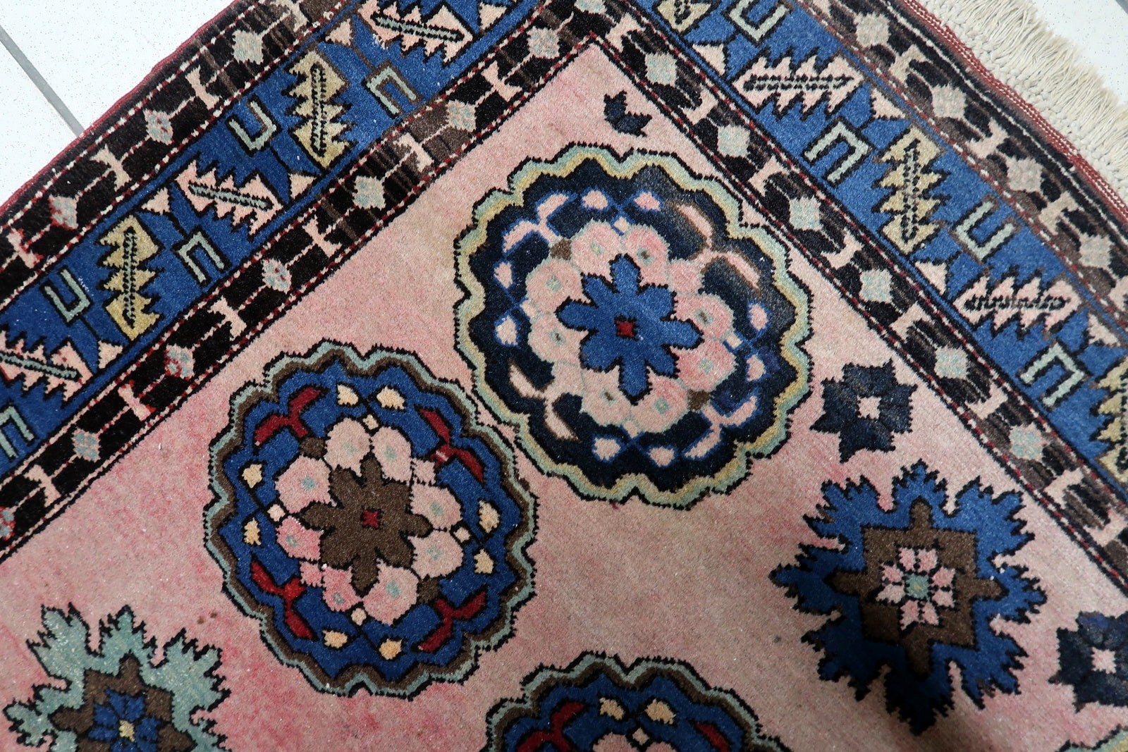 Geometric border pattern in navy blue and terracotta

